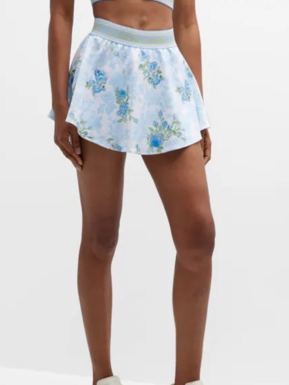 LoveShackFancy Balbino Performance skort w/ varsity waistband & floral print
